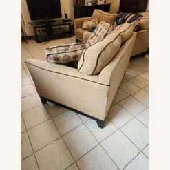 Bob's Discount Tan Love Seat With Pillows - 1500 1500 frame 0 1383