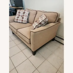 Bob's Discount Tan Love Seat With Pillows - 1500 1500 frame 0 1384
