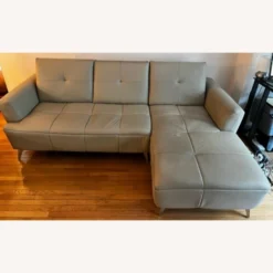 Jennifer Convertibles Leather Sectional Sofa